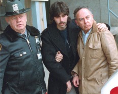 Jesse and Arnold Friedman under arrest