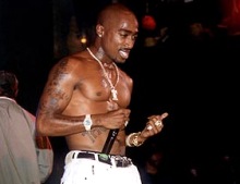 Tupac Shakur performs